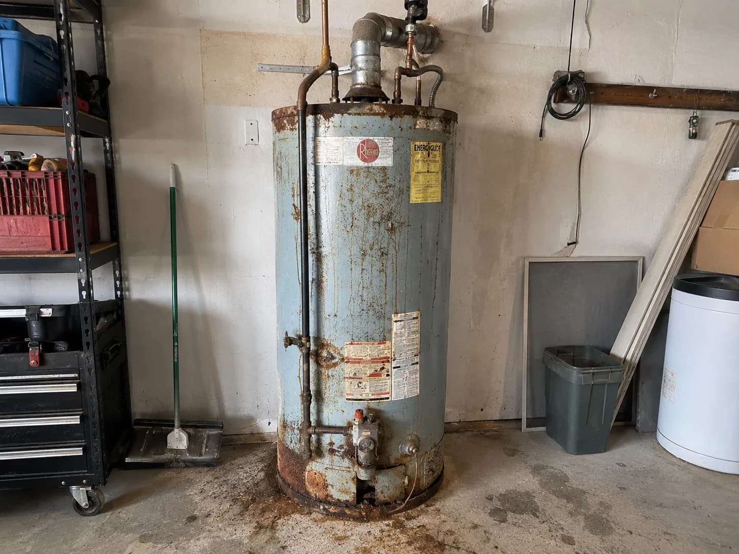 Old corroded water heater before replacement in Alpharetta, GA